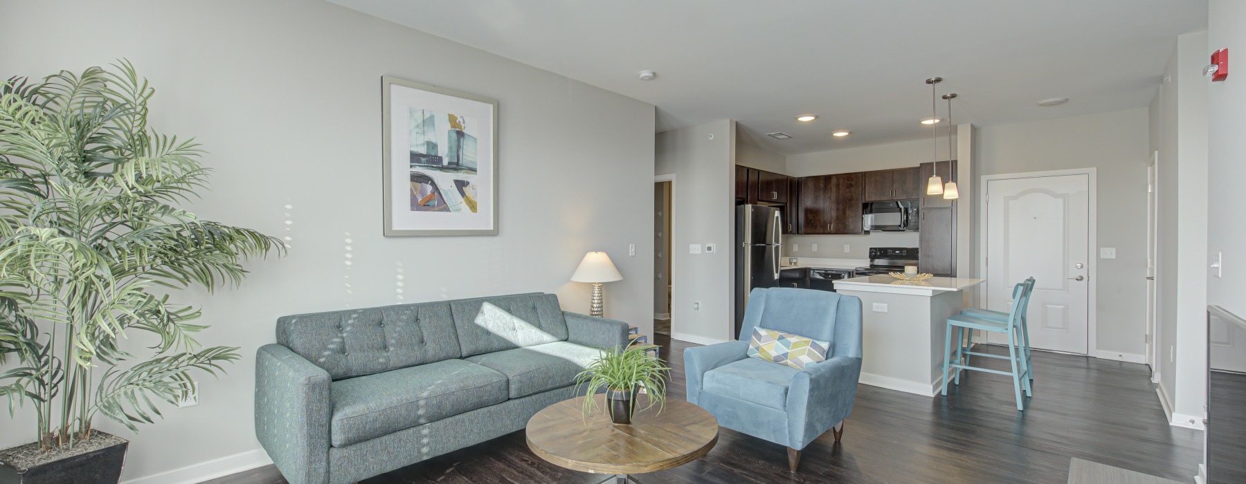 Living room with brown hardwood floors