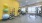 Gym with yellow wall and workout equipment